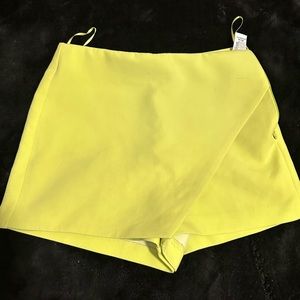 A neon yellow skort